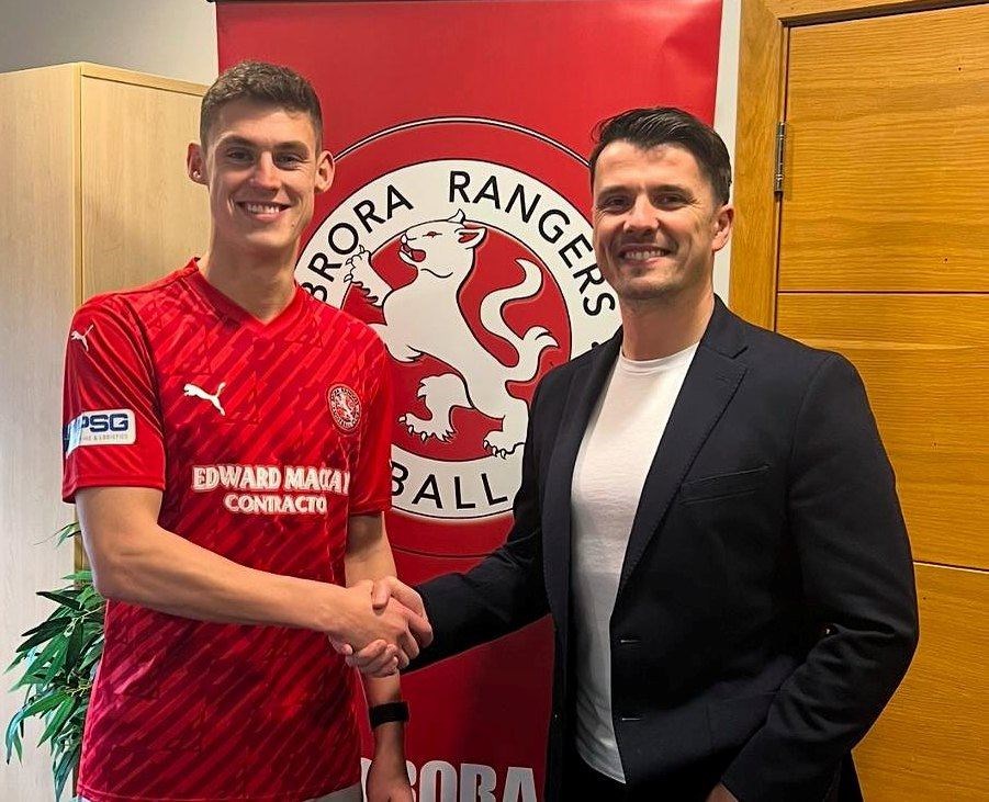 Wallace Duffy pictured with Brora Rangers manager Steven Mackay.