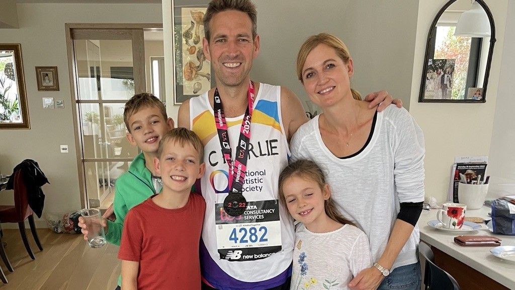 Charlie and Mel with their children Tom, Harry and Rosie.