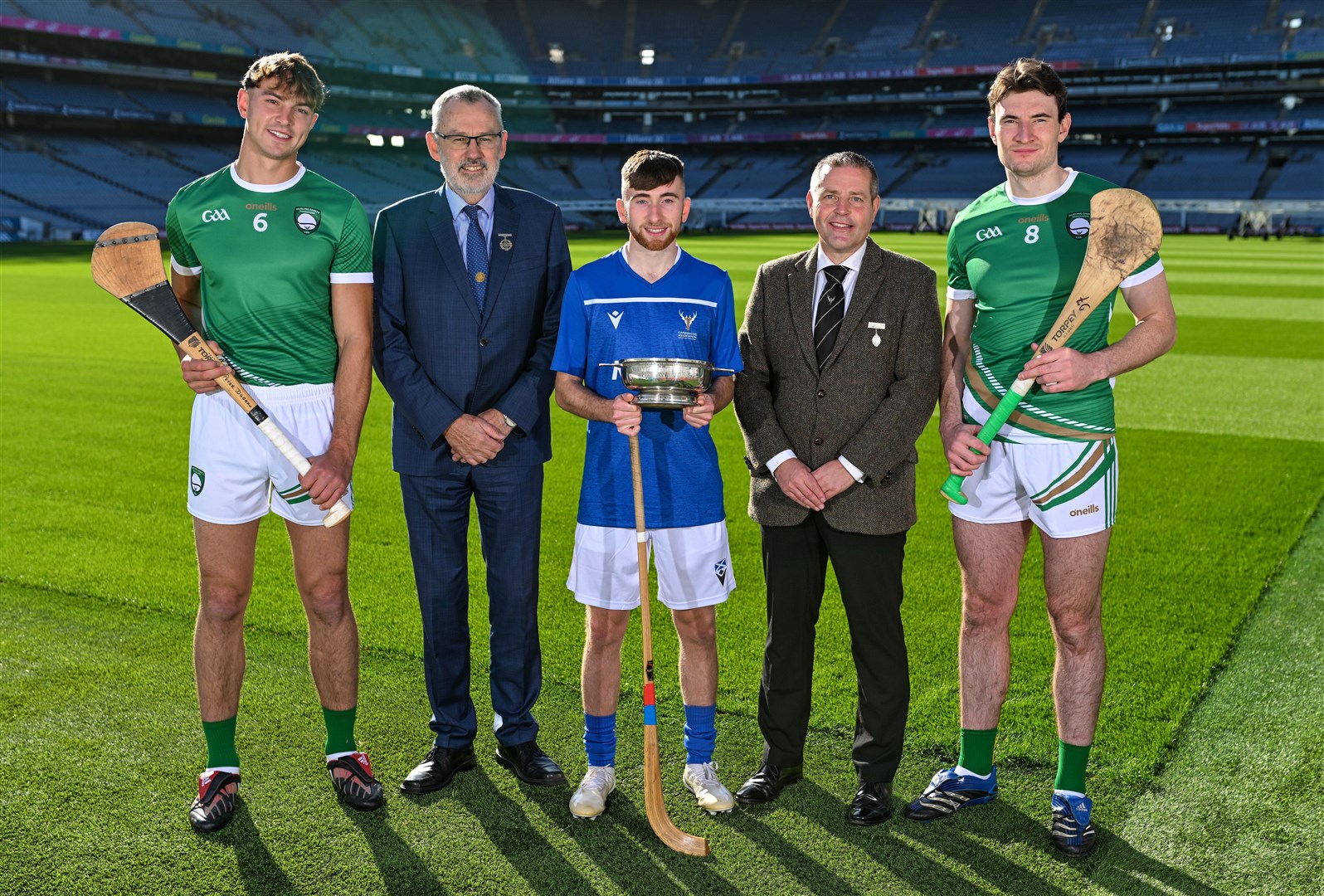 Ireland player Peter Duggan, Uachtarán Chumann Lúthchleas Gael; Larry McCarthy, GAA President; Scotland player Ruairidh Anderson (Kingussie); Camanachd Association president Steven MacKenzie and Ireland player David Fitzgerald at the Hurling Shinty International 2023 launch at Croke Park in Dublin.