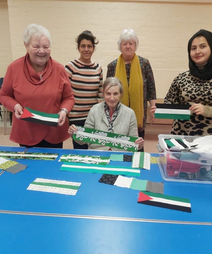 Highland Multicultural Friends creating a border for the project.