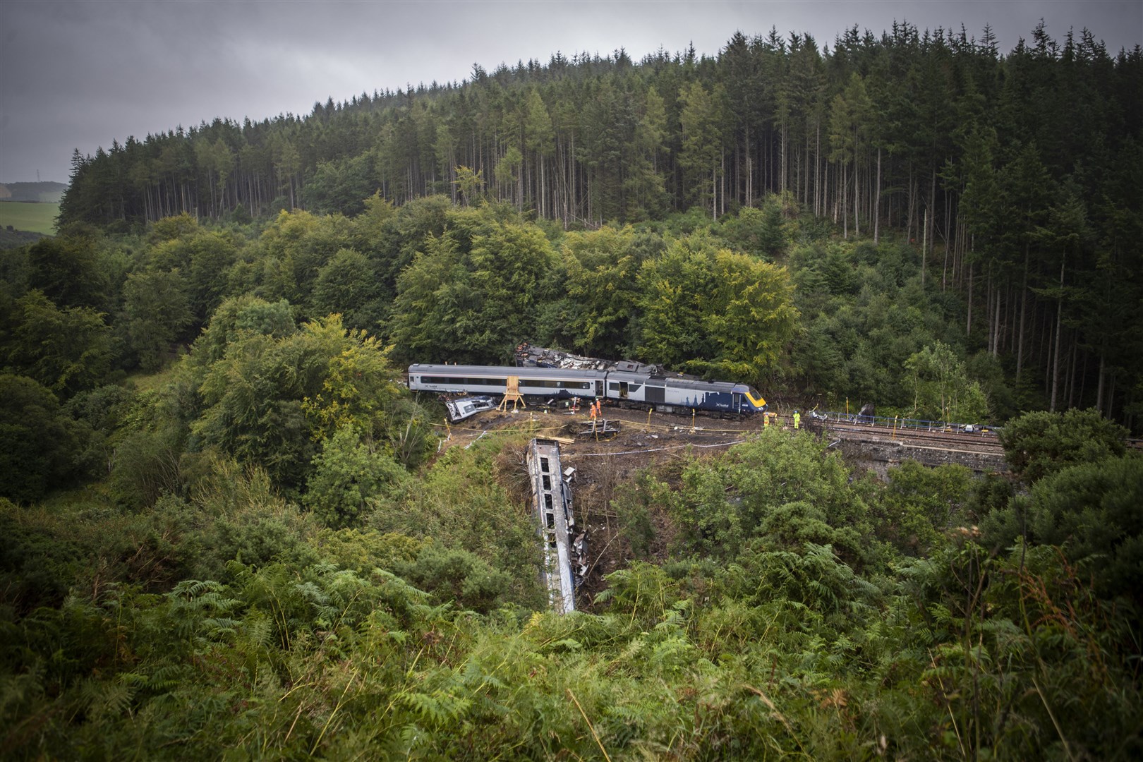 Investigators working at the scene of a derailment near Stonehaven, Aberdeenshire, which cost the lives of three people in August (Jane Barlow/PA)