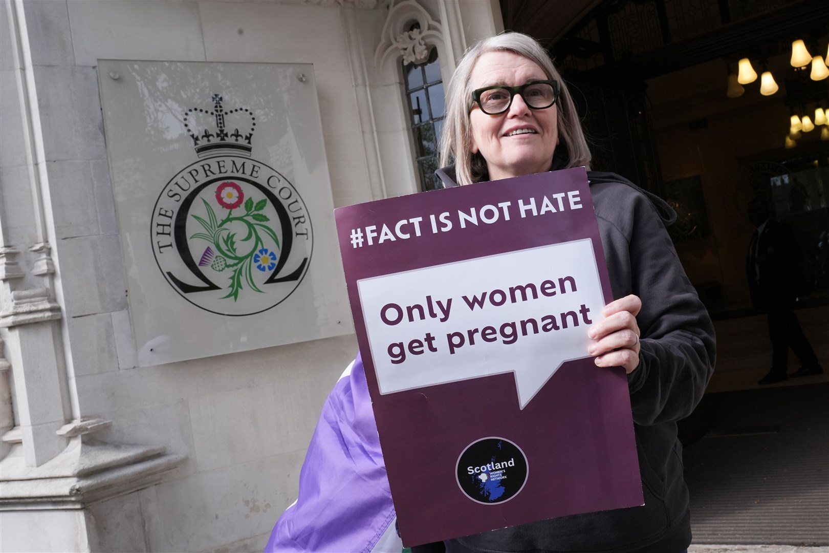 Campaigners outside the Supreme Court (Lucy North/PA)