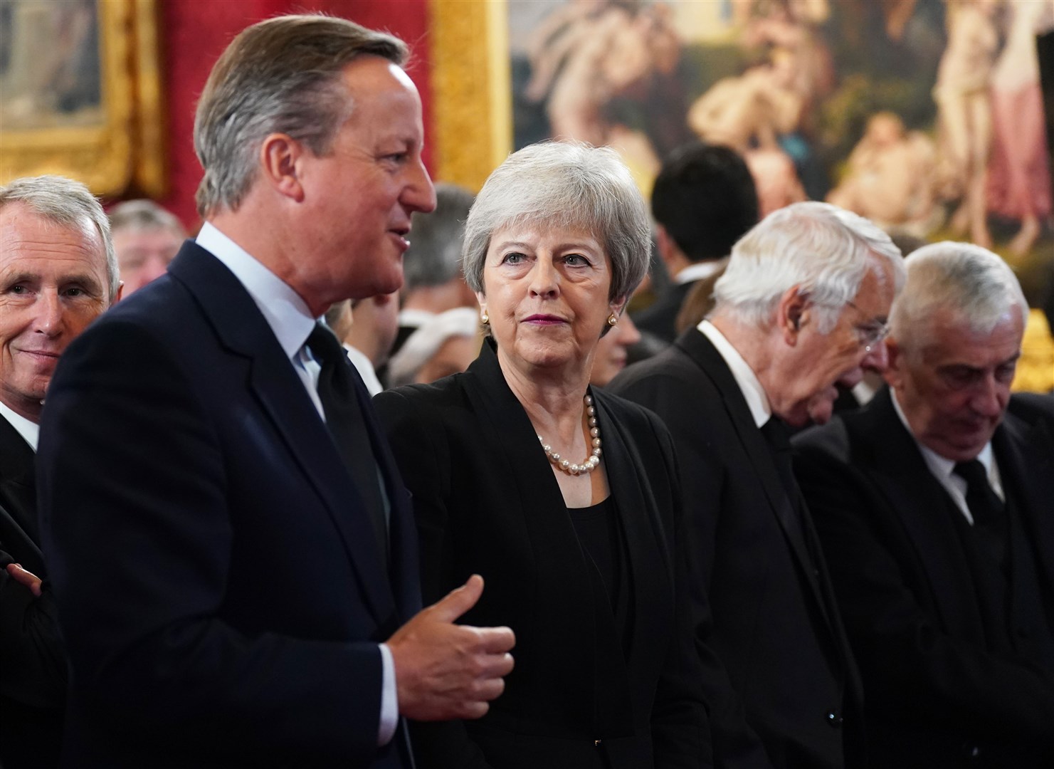 Former prime ministers David Cameron and Theresa May at the Accession Council (Kirsty O’Connor/PA)
