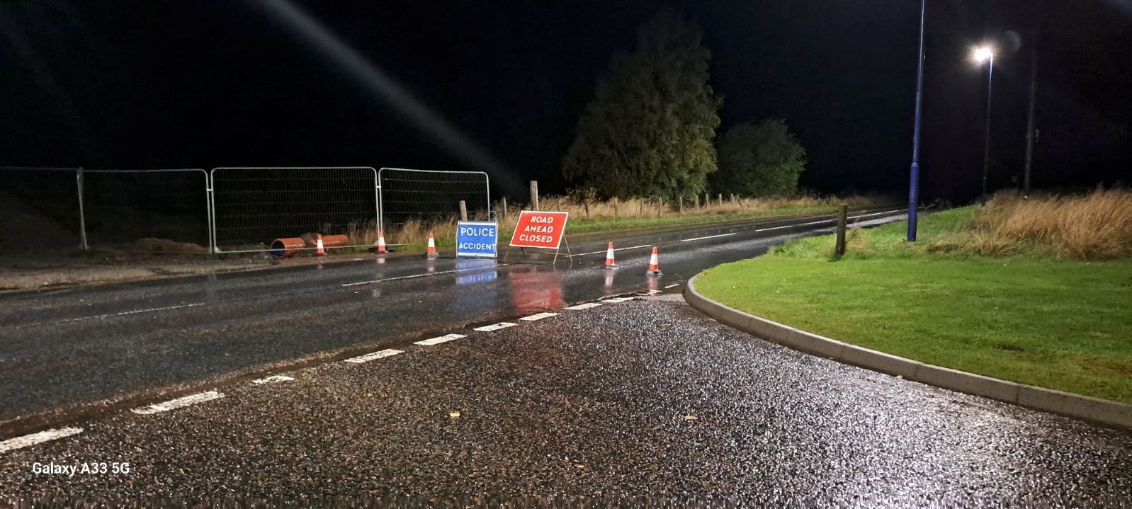 ROAD CLOSED: The sign remained at the junction of the main road and Dougal Drive through the night but the road opened at 8am.