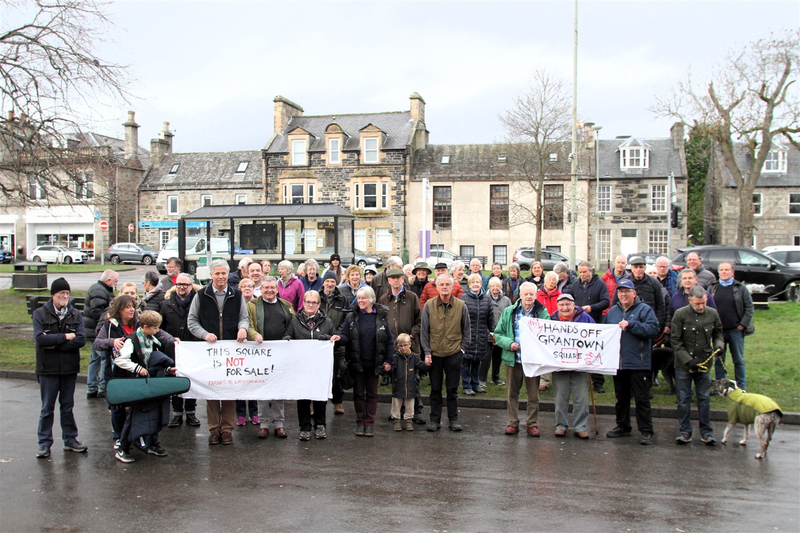 TAKING A STAND: People of Grantown demonstrating against the proposal to charge for use of their Square. Pictures: Frances Porter