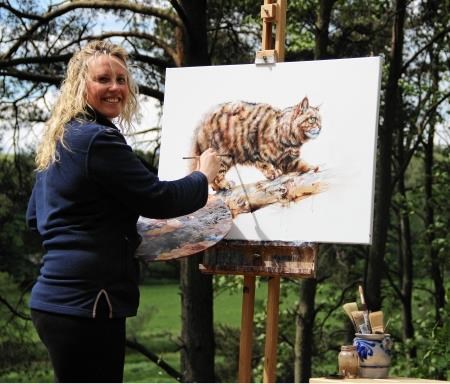 McMaster at work on her Scottish Wildcat painting