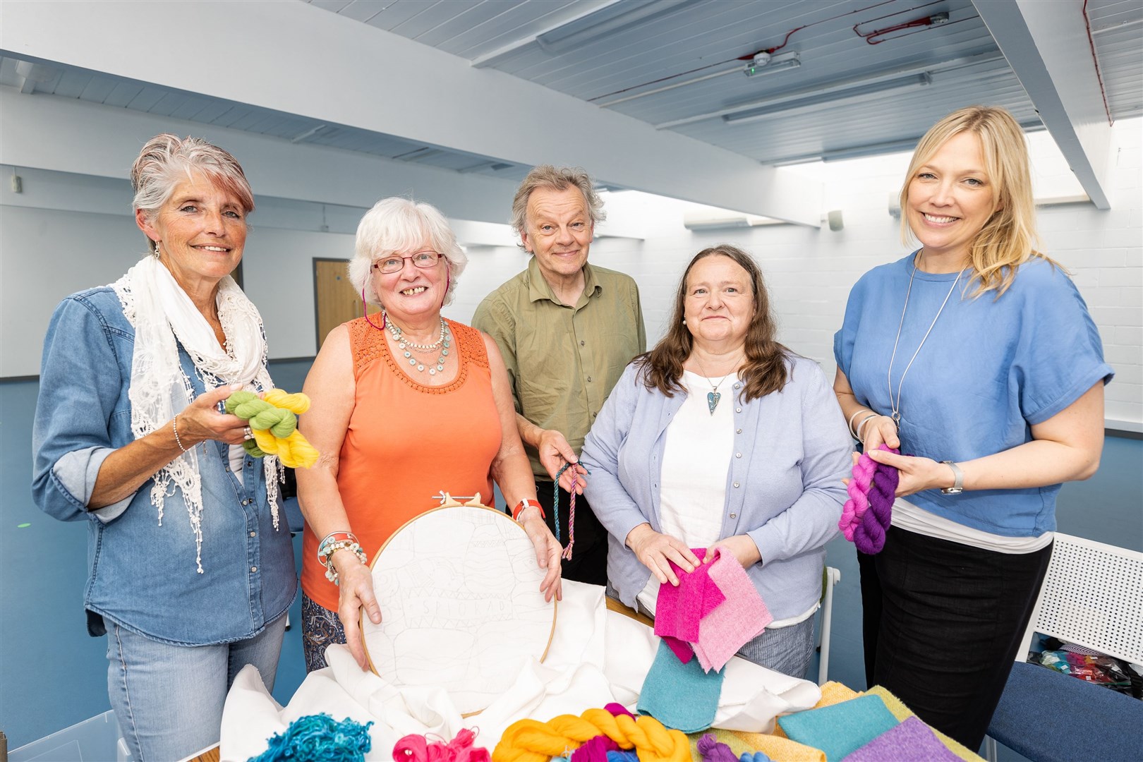 Stitchers Norma Bain, Julie Coghill and Anne Thackray are pictured with Andrew Crummy and Kirstie Campbell.