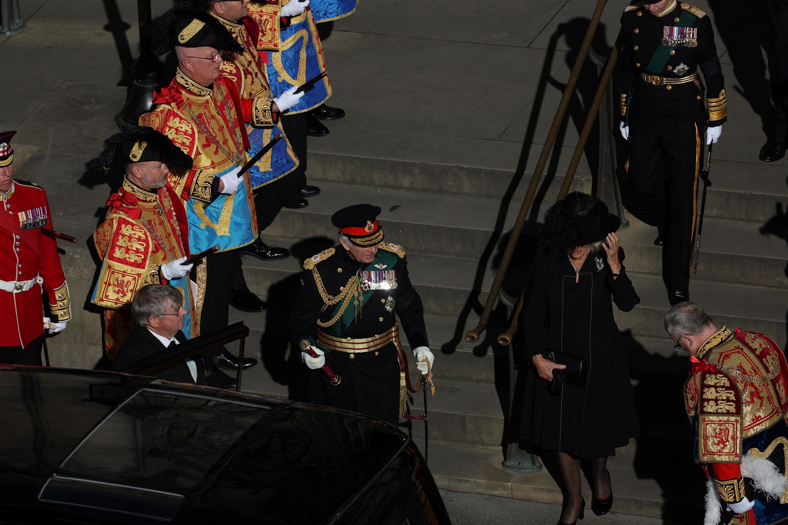 King Charles III and the Queen Consort leave after the service (Russell Cheyne/PA)