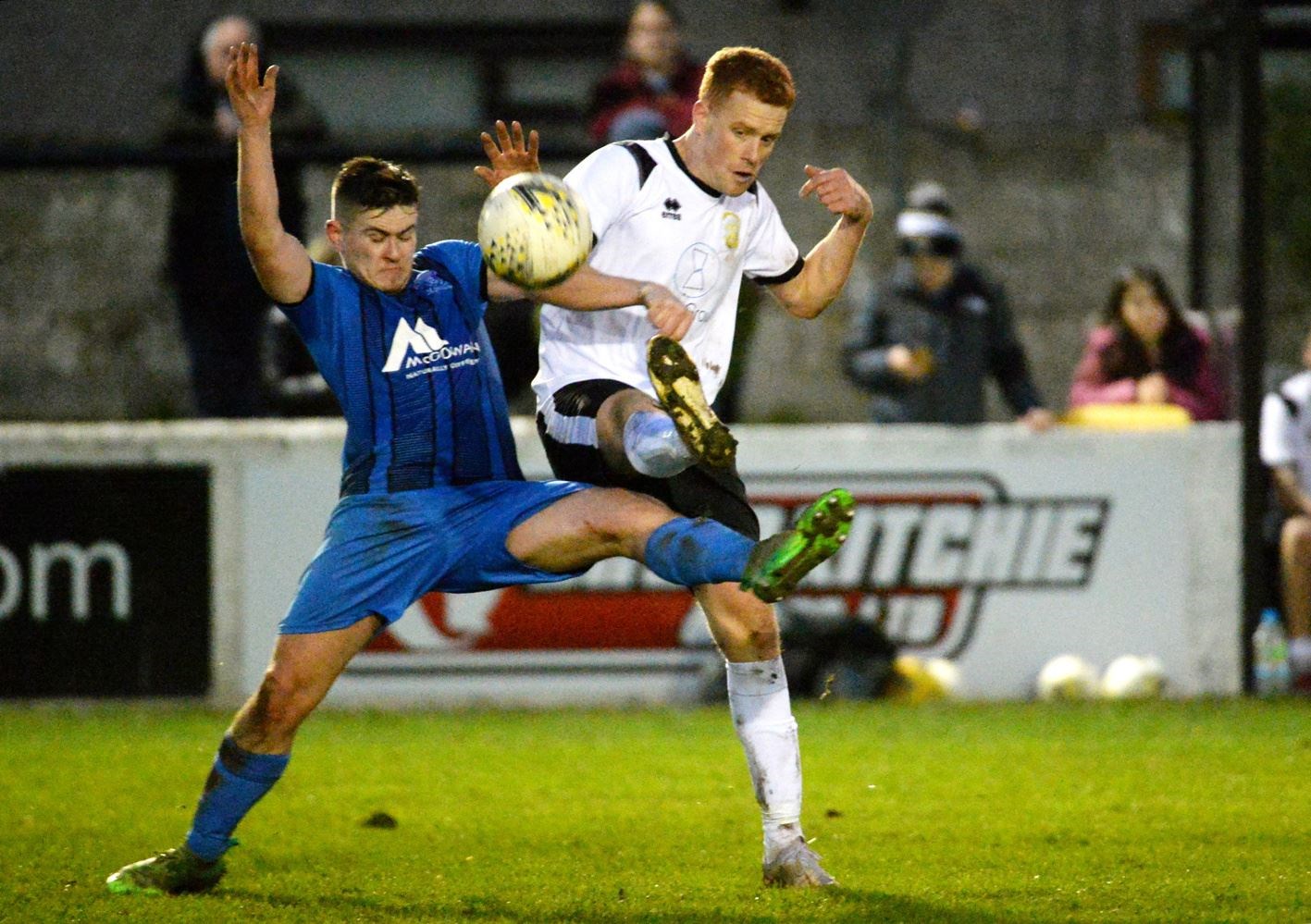 Stephen Rennie puts in a challenge on Clach’s Scott Morrison. Pictures: James Mackenzie