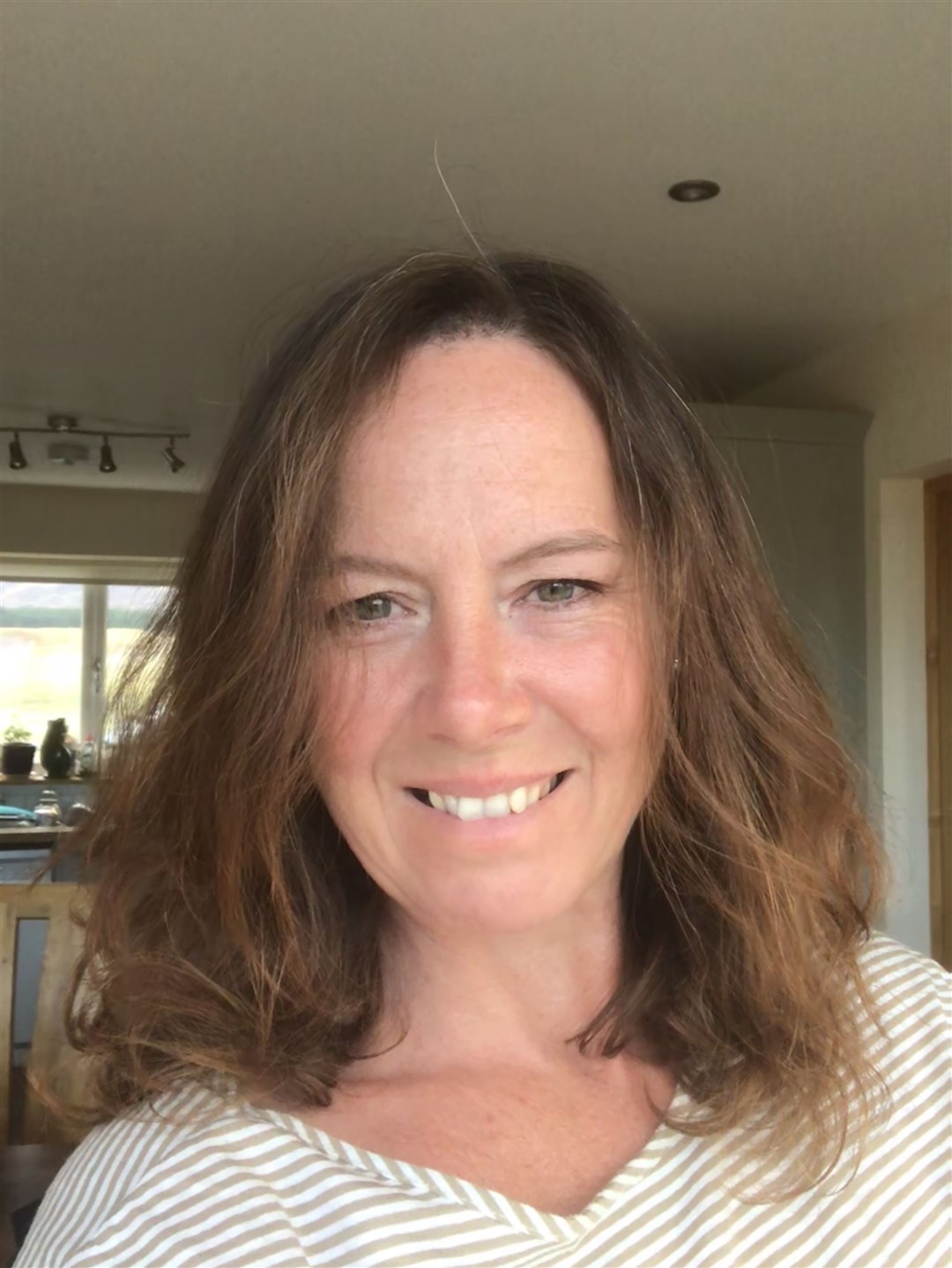 BEFORE: Lisa Ross ready for her shave