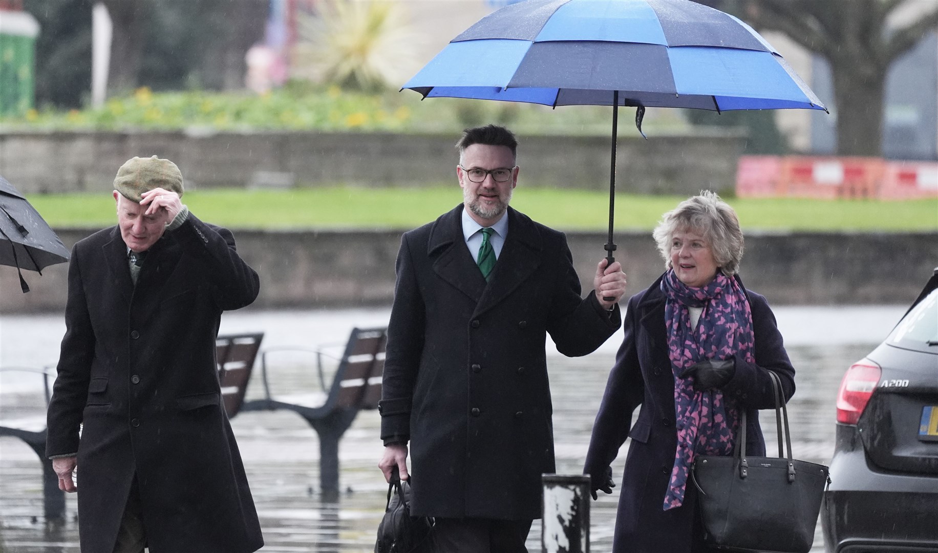 Bargain Hunt star Charles Hanson (centre) arrives at Derby Crown Court (Jacob King/PA)