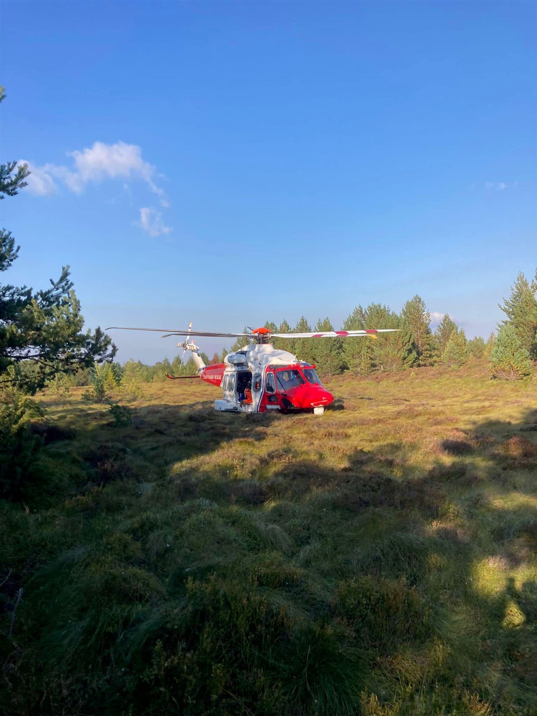 The rescue helicopter after it landed near the Ryvoan Bothy. Picture: Cairngorm Mountain Rescue Team.