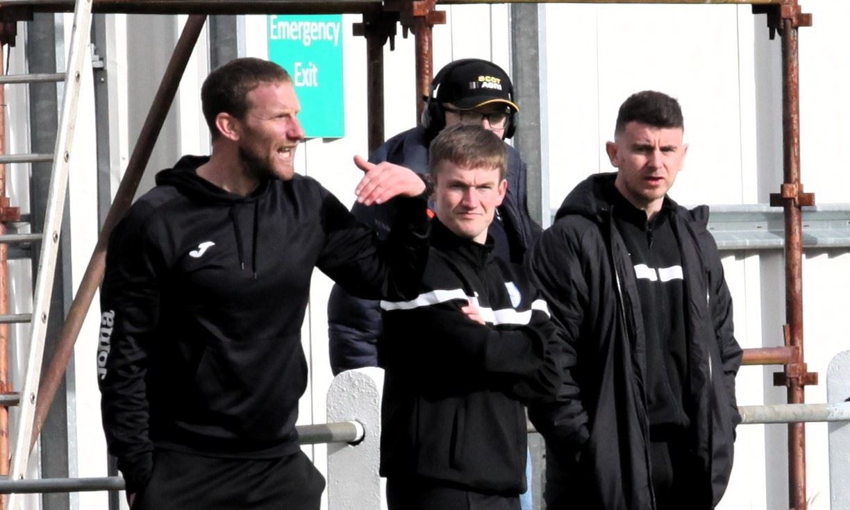 Ryan Esson with assistants Don Johnstone and Aaron Doran on the touchline at Seafield Park.