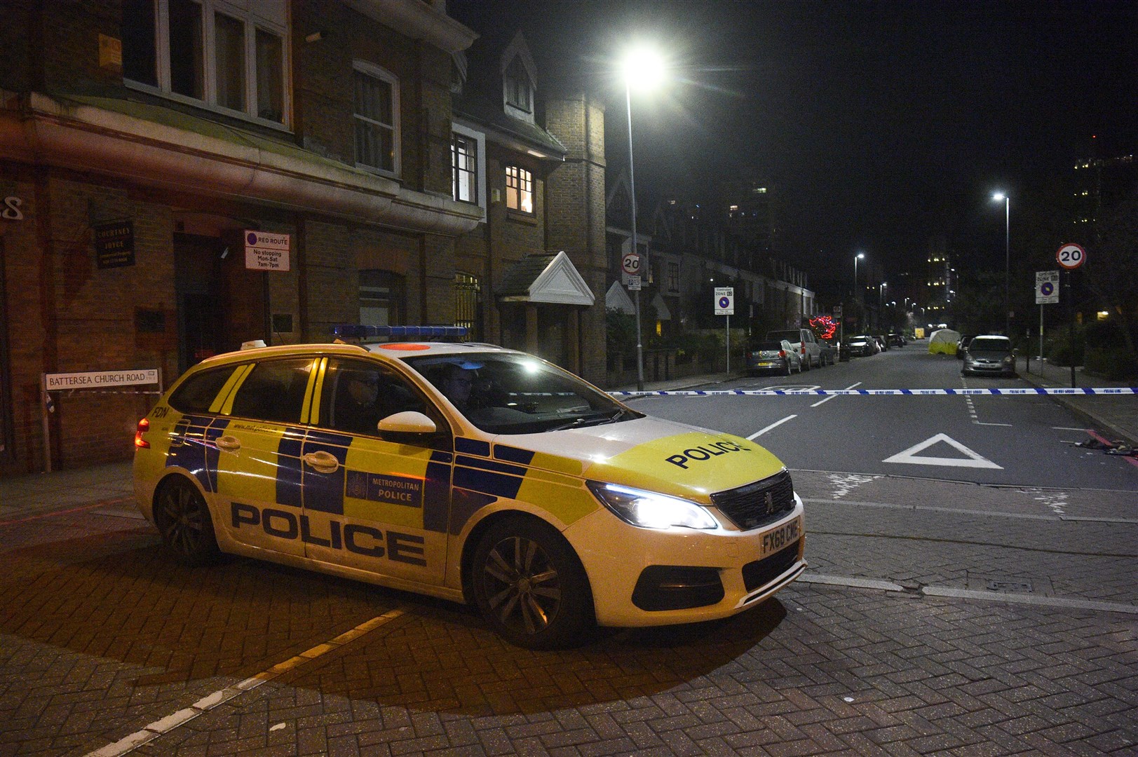 Police in Battersea Church Road (Kirsty O’Connor/PA)