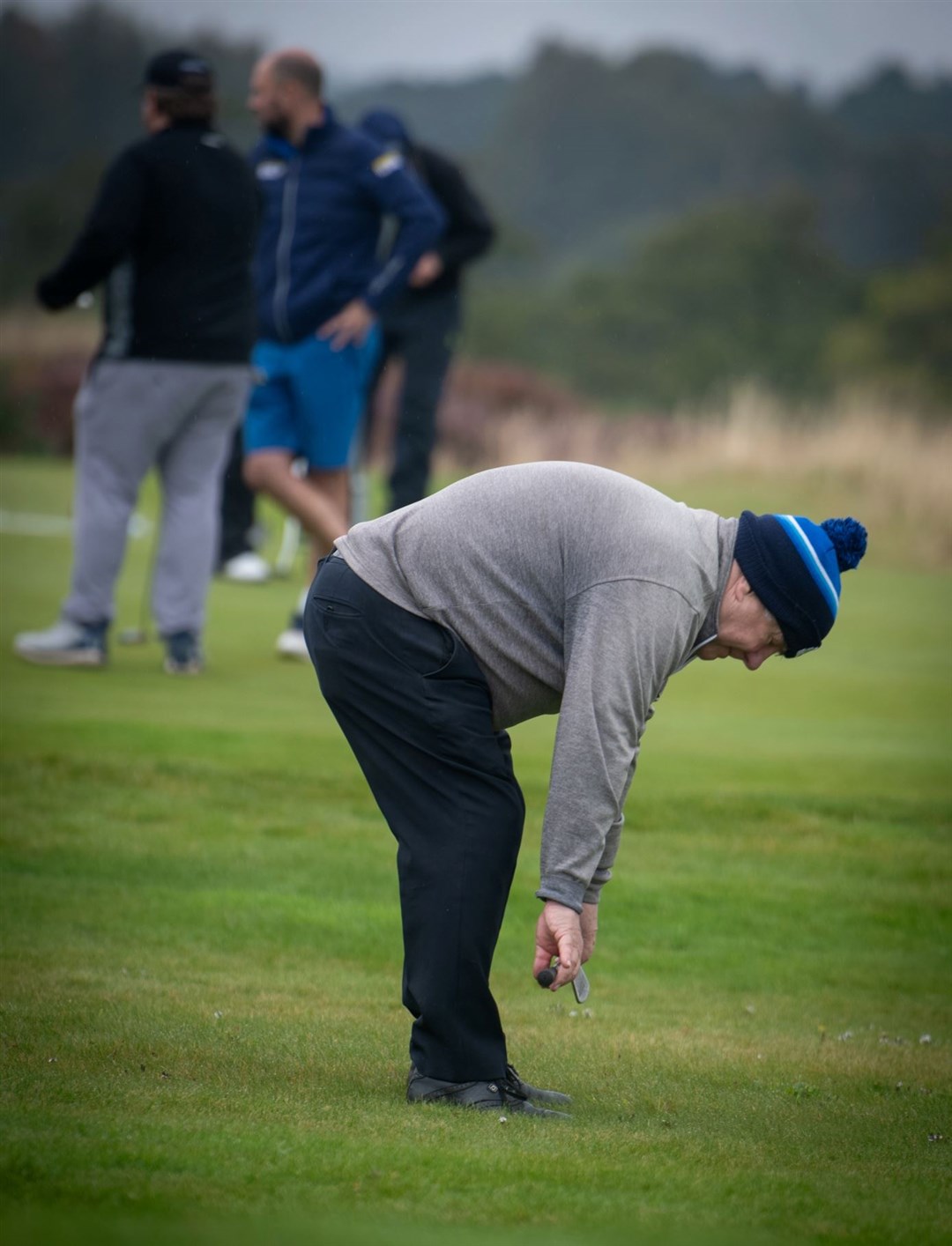 Doing some stretches to get the body ready for the 18 holes.