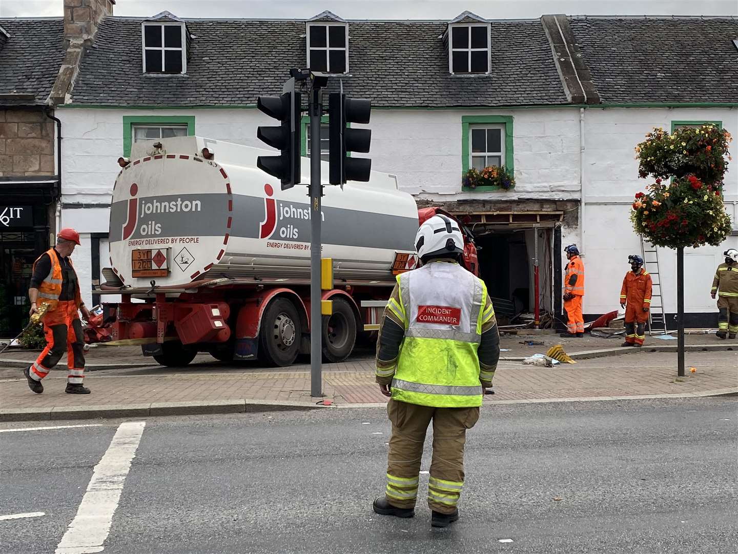 Oil tanker being removed from Beauly shop.