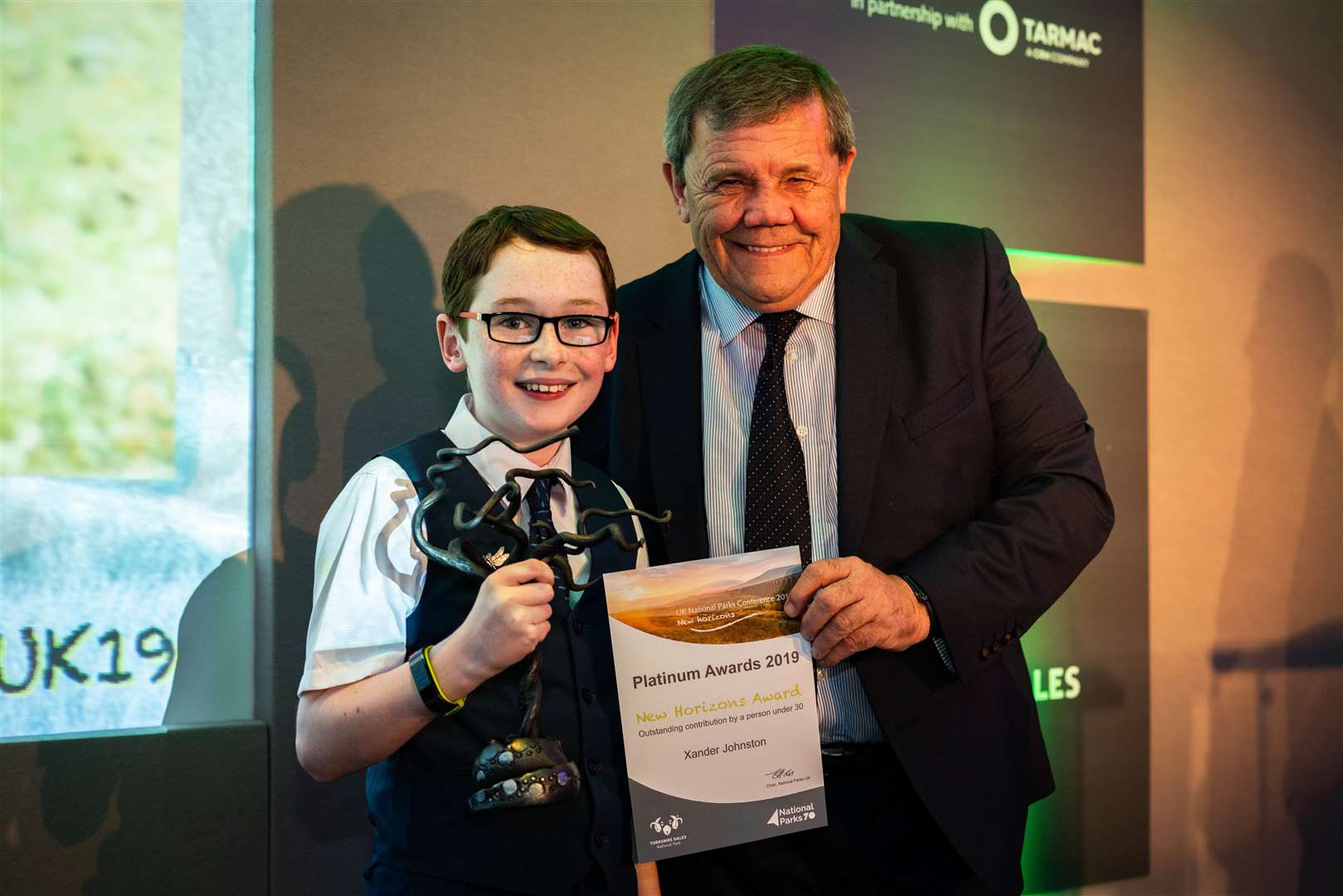 Xander receiving his award from Carl Lis, Chairman of the Yorkshire Dales National Park Authority. The event was held in Leeds.