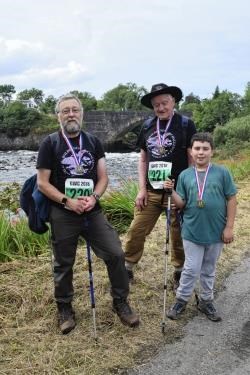 Tom Lister (left), Stephen and Jacob at the end of their fundraising trek.