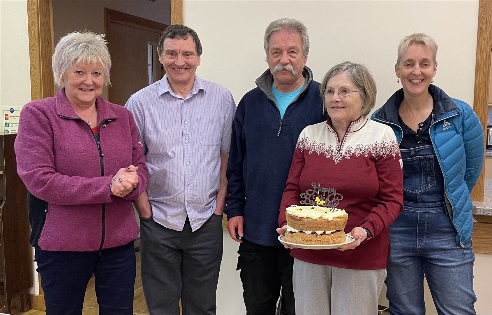 At the successful AGM in Aviemore are, from left, Jennifer Lobban, Dougie Graham, Les Andean (association chair), Bridget Clyde (with her cake) and Clare Blair.