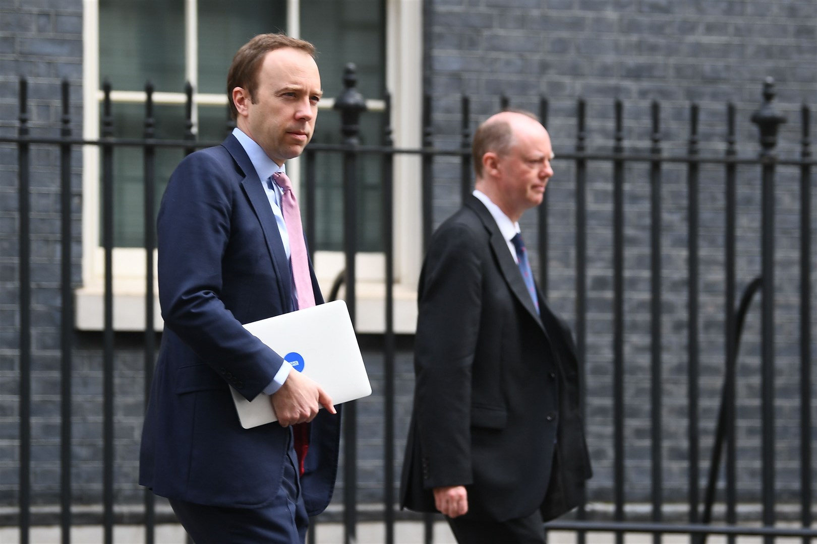 Matt Hancock and Chris Whitty leave 10 Downing Street (Victoria Jones/PA)