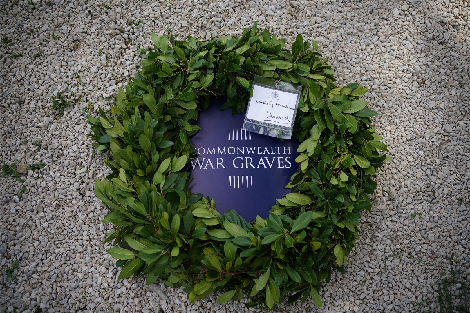 A wreath and card which reads ‘Everlasting remembrance, Charles R’ is laid by the Princess Royal at Seddel-Bahr Military Grave in the Gallipoli Peninsula, on behalf of the King, Colonel-in-Chief of The Royal Welsh, on the grave of Lieutenant Colonel Charles Doughty-Wylie VC (Yui Mok/PA)