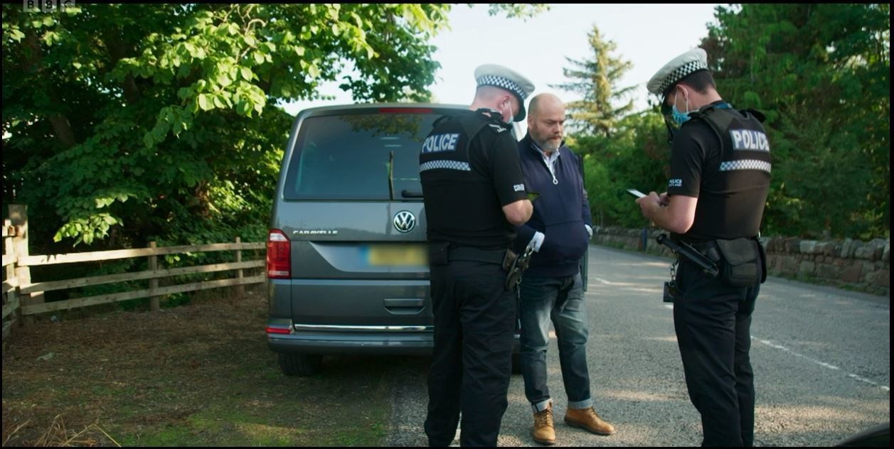 Anders Holch Povlsen with Highland traffic police after being caught speeding. Courtesy: BBC, Highland Cops.