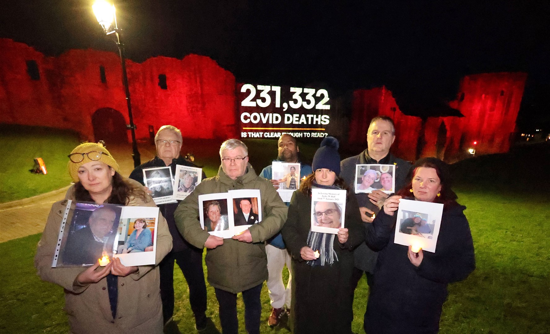 Grieving families holding a vigil for loved ones lost to Covid-19 outside Barnard Castle (Raouil Dixon/PA)