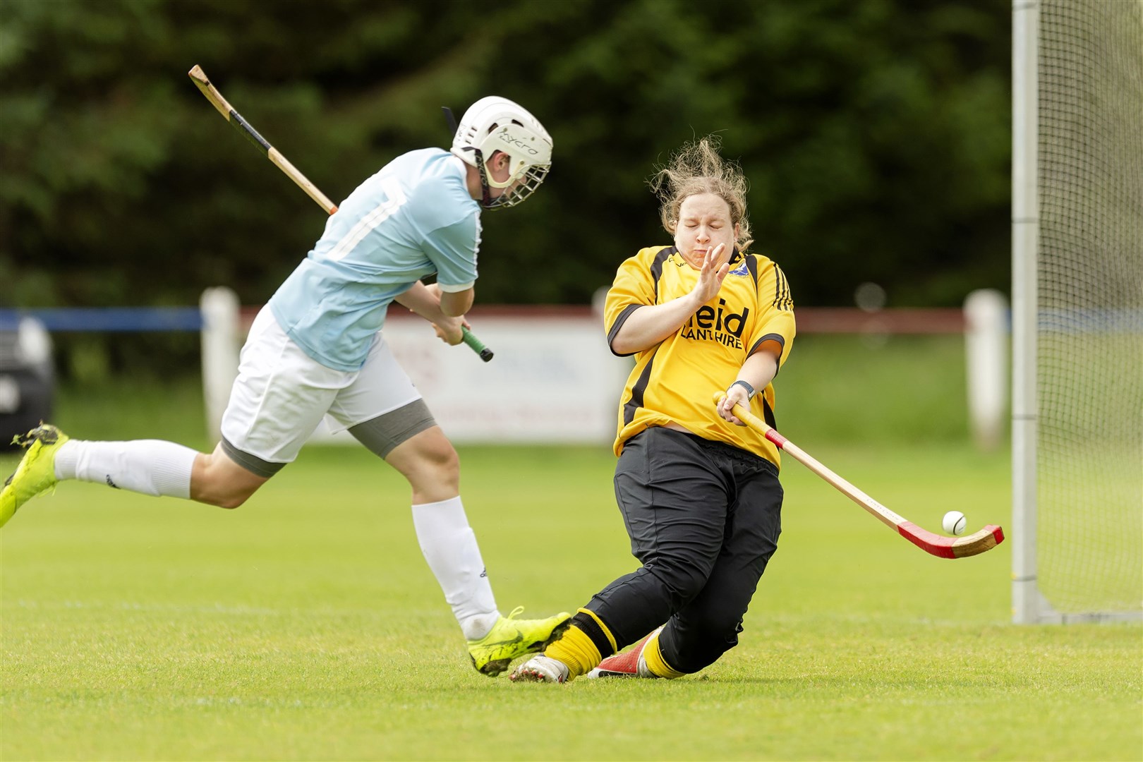Badenoch keeper Elizabeth McGregor stops a shot from Lorna Macrae (Skye) at The Dell in Kingussie.