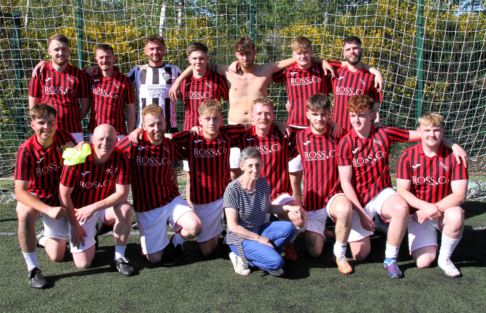 The Aviemore Thistle team who won the game 4-3 along with Angela Gibb.