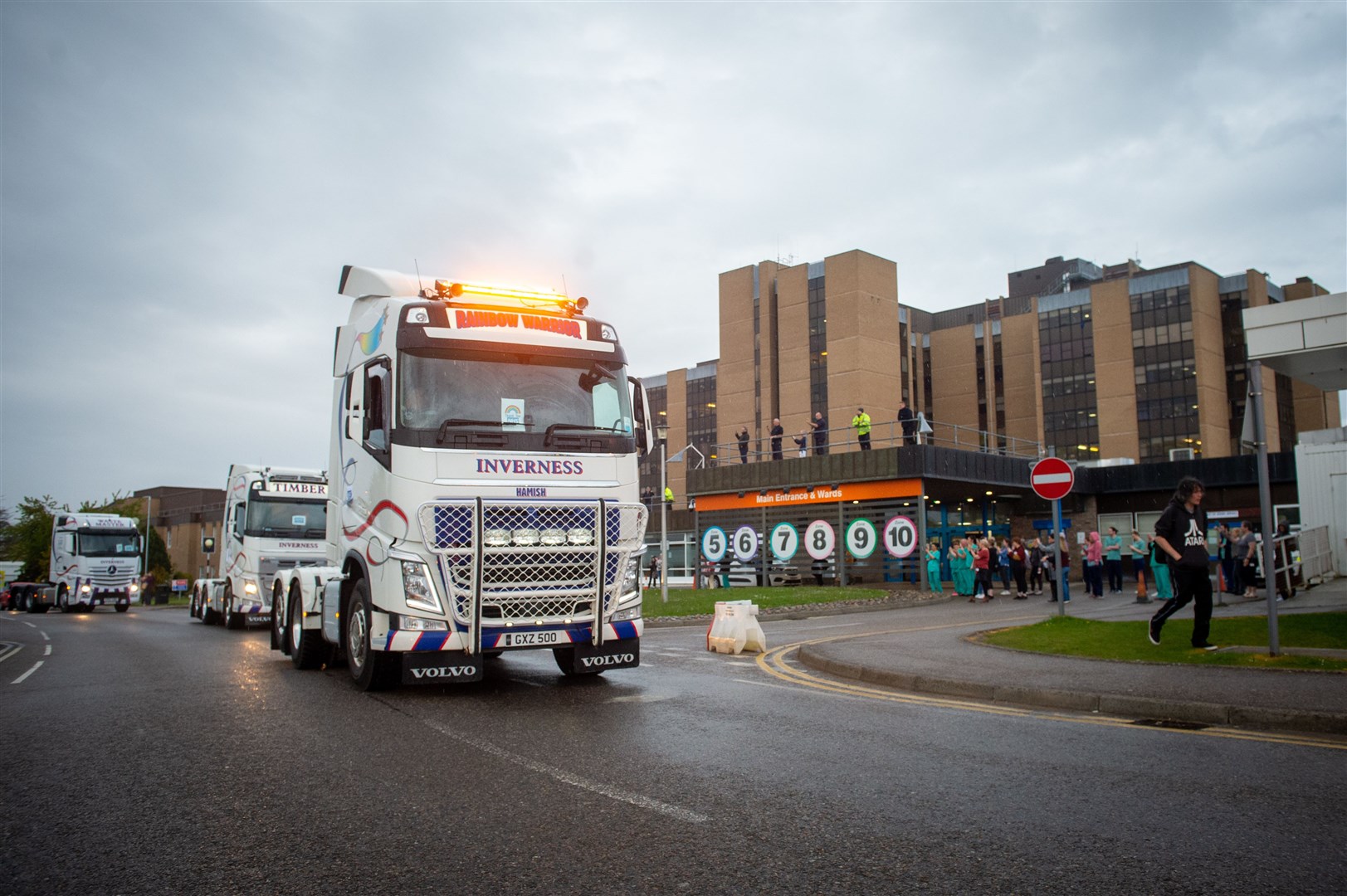A convoy of heavy goods and agricultural vehicles pass by Raigmore Hospital in support of hard-pressed frontline NHS staff and other key workers.