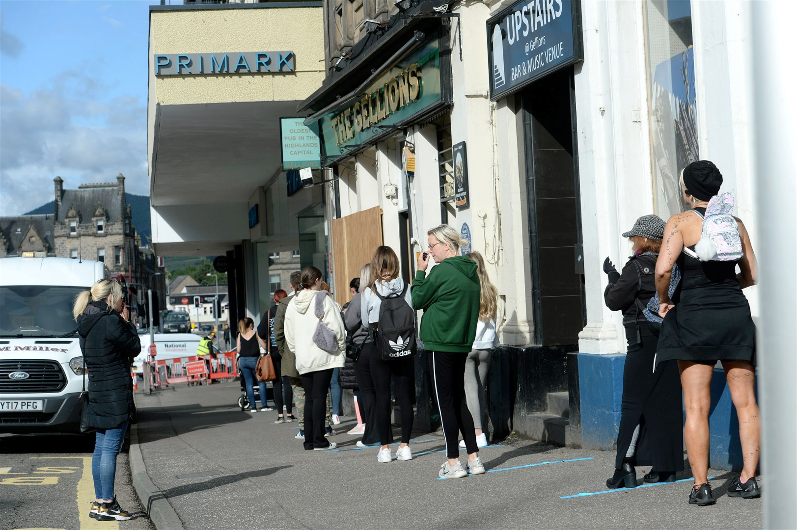The queue saw shoppers socially distanced along the High Street and into Church Street.