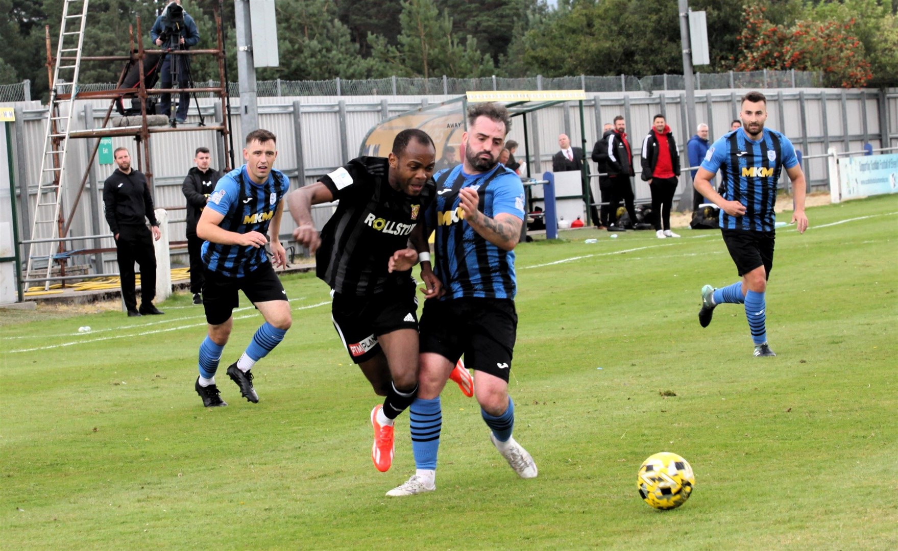 James Fraser in a tussle for the ball in Saturday's 4-0 defeat at Seafield Park to Formartine United. Picture: Frances Porter.
