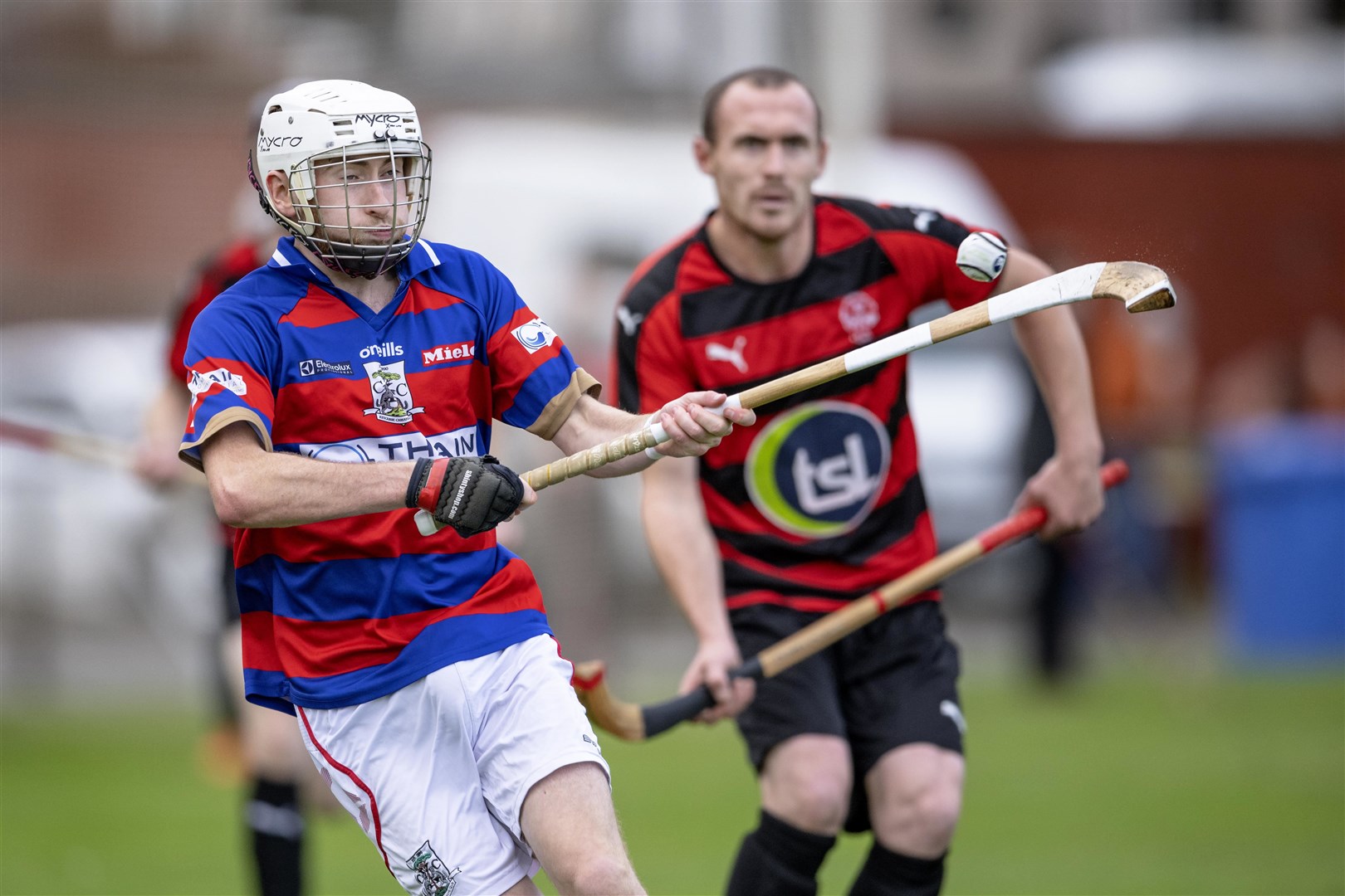 Close control by Kingussie's Ruaridh Anderson in the Oban Camanachd title winning game. Picture: Neil Paterson.