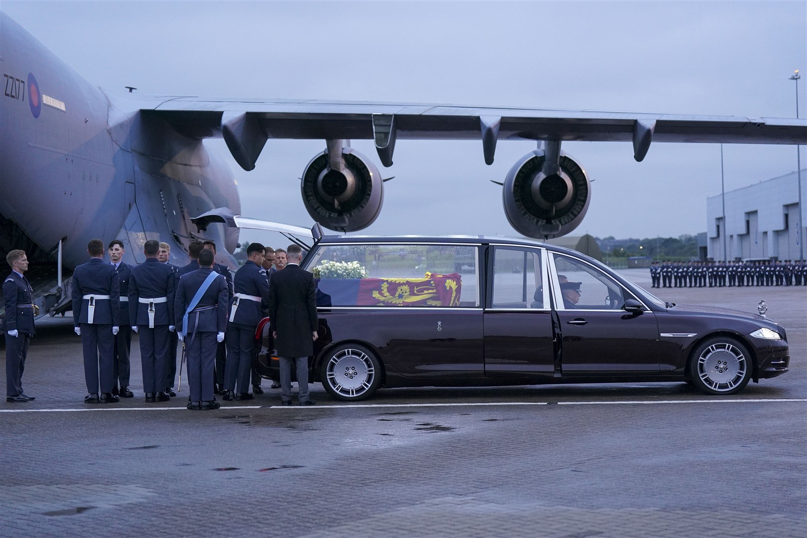 The coffin of Queen Elizabeth II is placed in the waiting hearse at RAF Northolt, west London (Arthur Edwards/The Sun/PA)