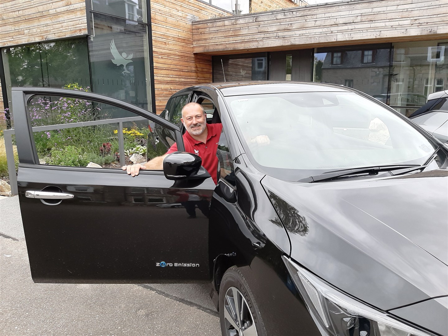 CNPA facilities officer Mark Pocock with one of the new electric cars.