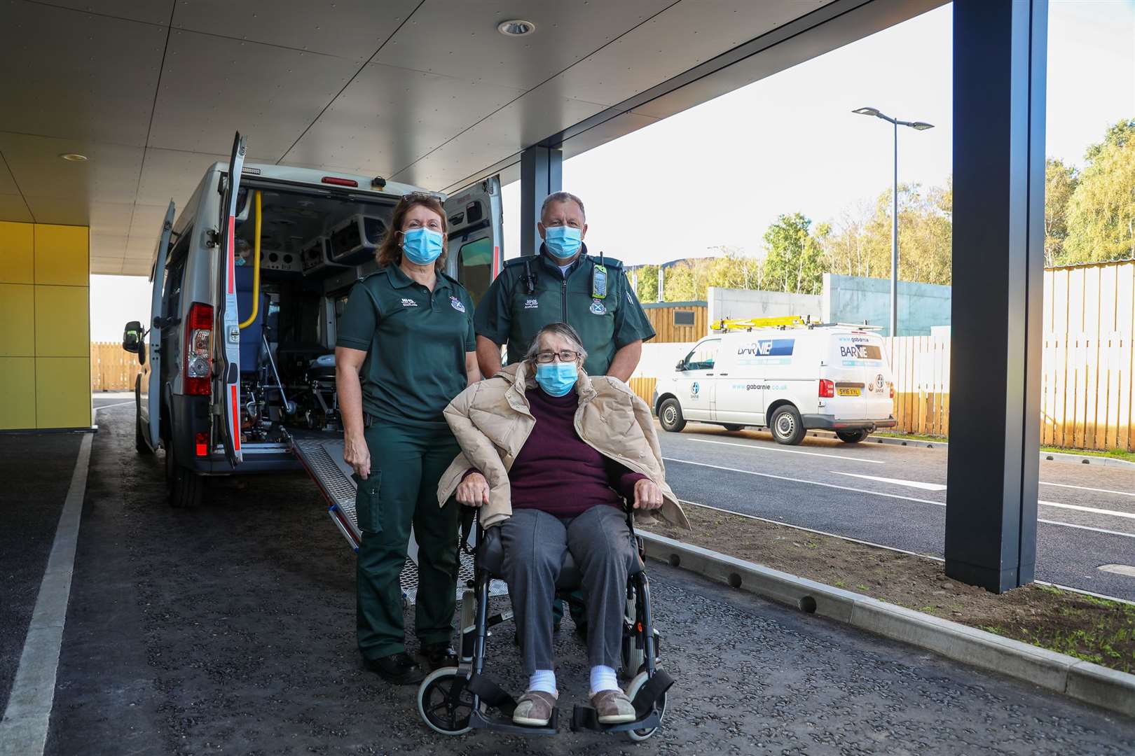 Scottish Ambulance Service staff members Suzanne Samuels and Adam Fell transfer Sarah Lyons to the new hospital. Ms Lyons was the first in-patient to arrive at the new facility in Aviemore and had previously been in St Vincent's Hospital in Kingussie. Photos: Aidan Woods
