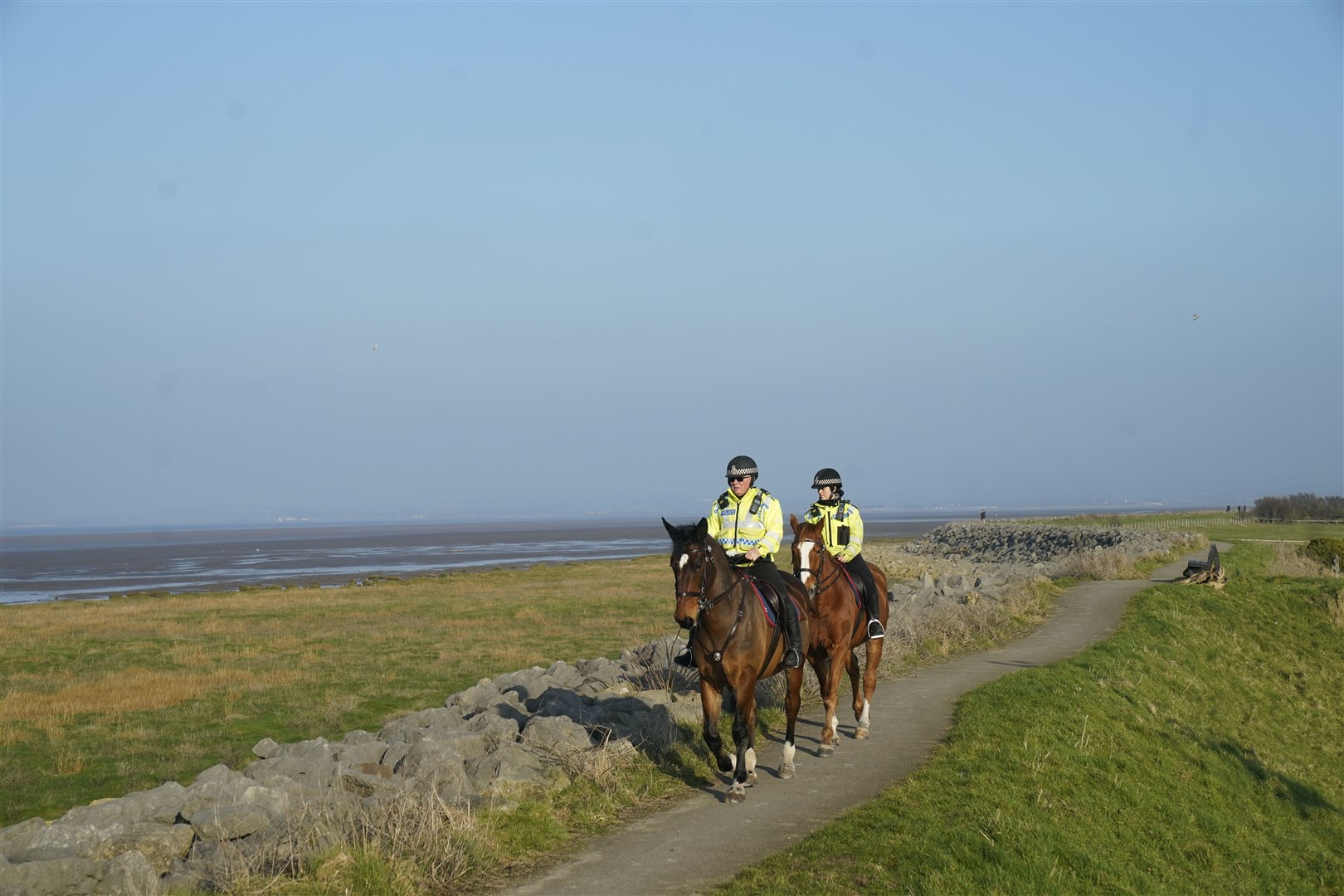 Mounted police in Knott End-on-Sea take part in the search for Nicola Bulley (Danny Lawson/PA)