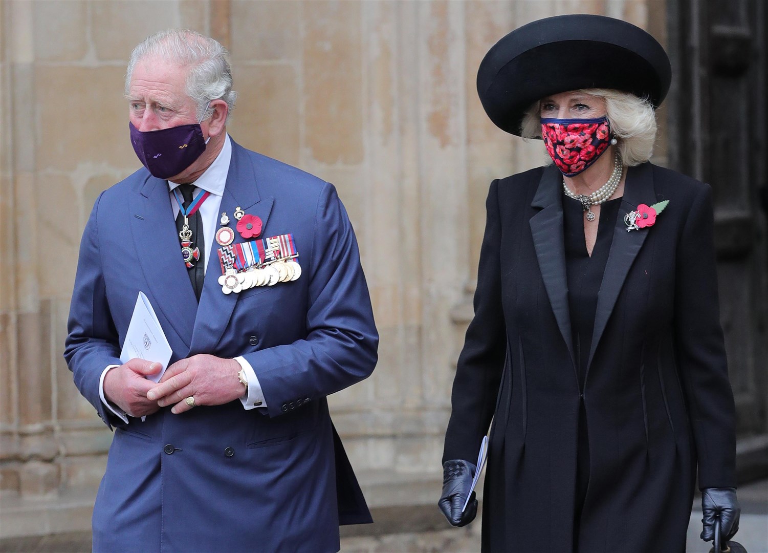 The Prince of Wales and the Duchess of Cornwall leave Westminster Abbey after the Armistice Day service (Aaron Chown/PA)