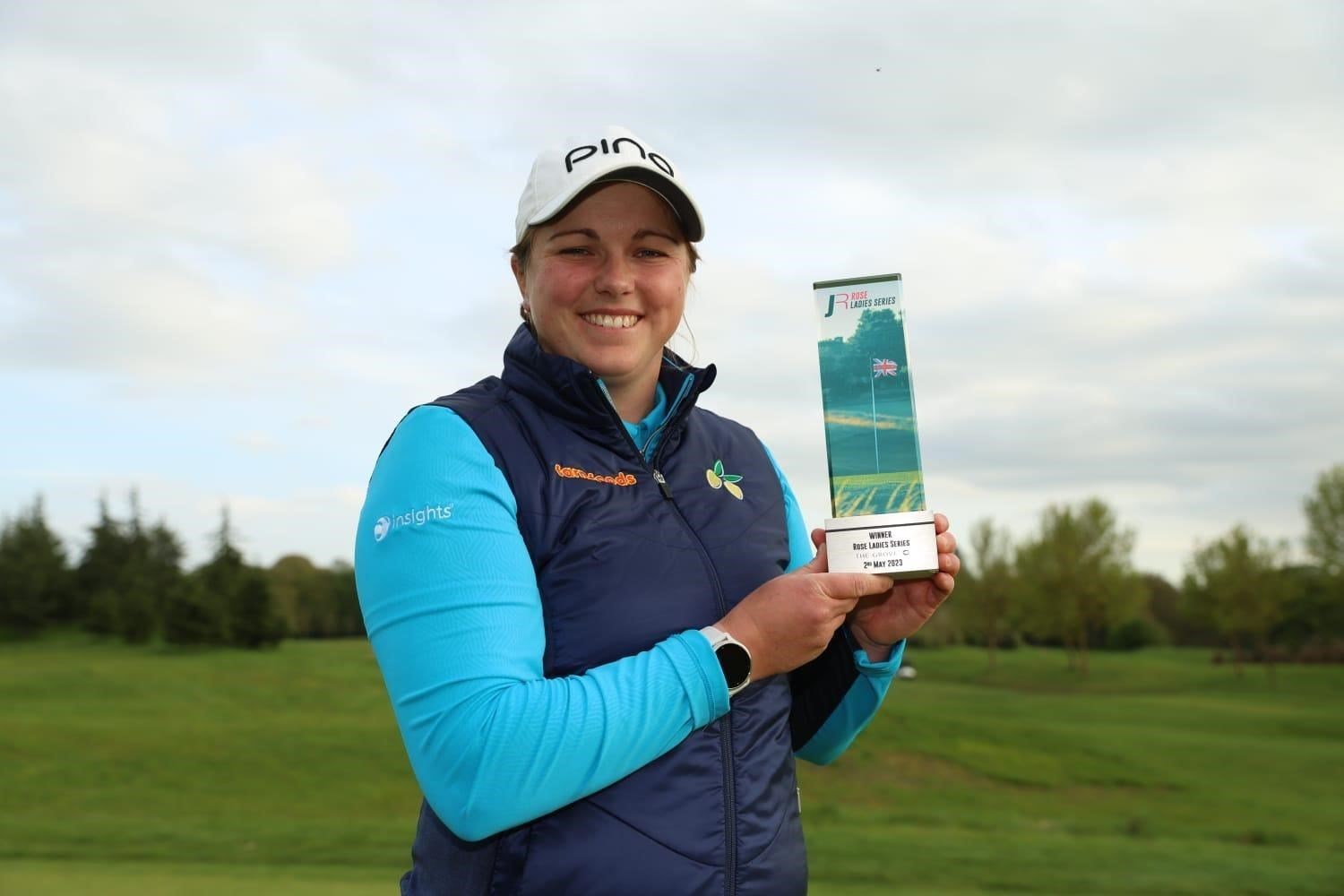 Hannah McCook shows off her winning smile after her maiden win as a pro.