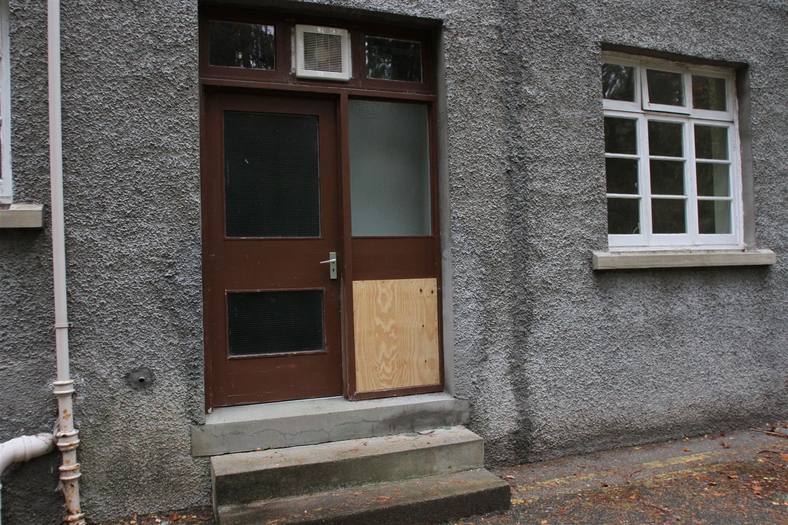 BOARDED UP: Some repairs have been done after the latest spate of vandalism but more work is needed with some windows still broken and a ceiling reportedly down now inside. Photos: Frances Porter