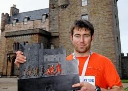 Proudly showing off his trophy from Sunday’s Mey10k is men’s winner Jack Trevelyan.Photo: John Baikie / Captiv8.
