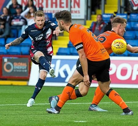 Michael Gardyne has a shot against Dundee United.
