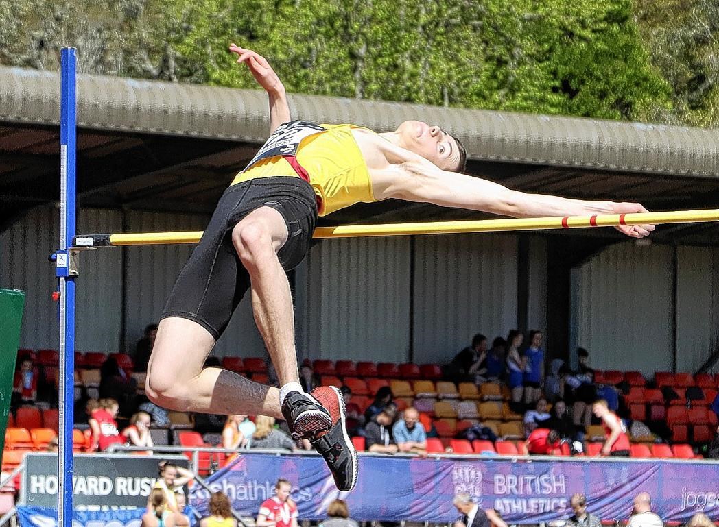 Angus Davren competes in the high jump.