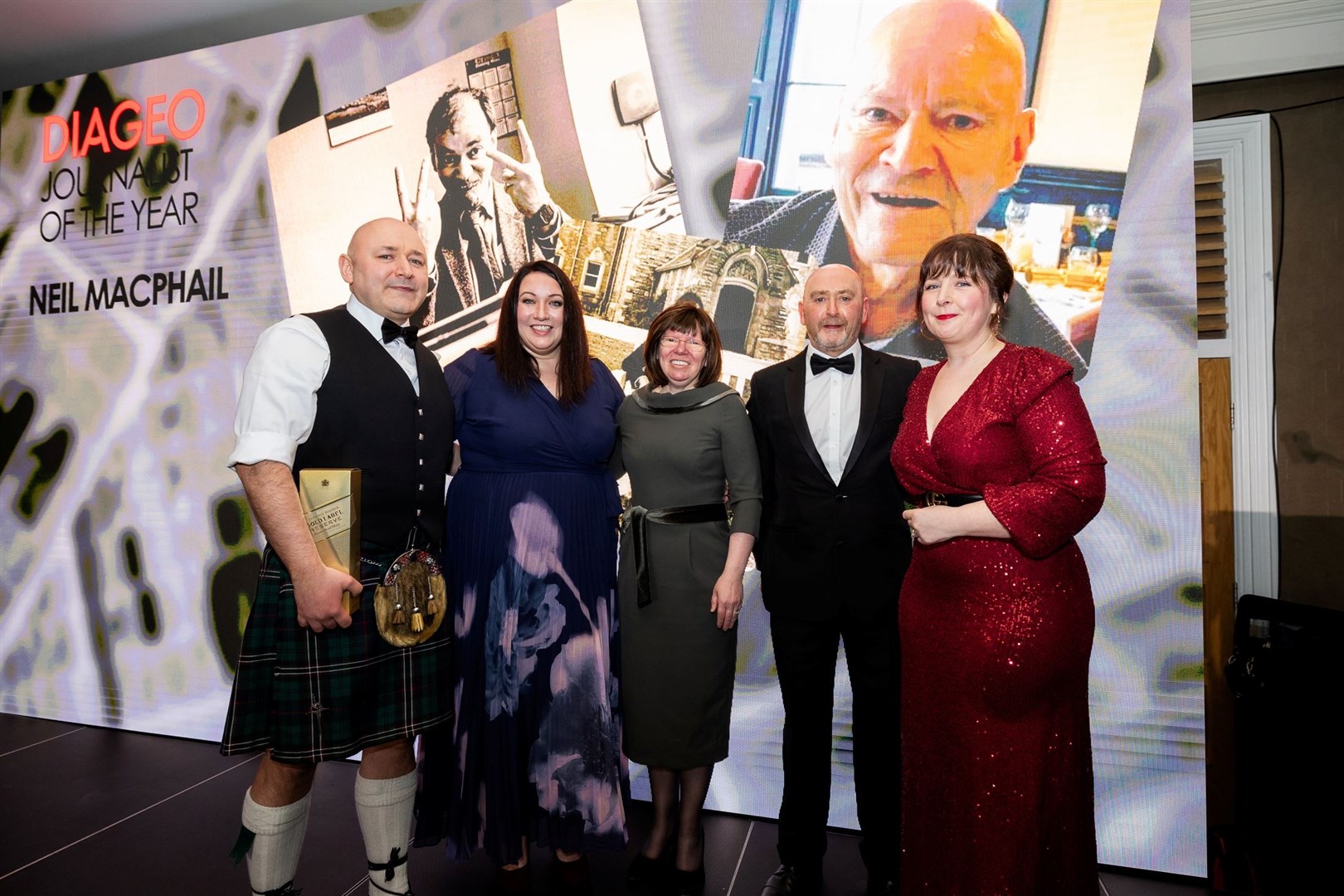 Neil MacPhail, who passed away in November, was name journalist of the year. Neil’s daughter, Lindsay, and son, Calum, collected the award on behalf of their father. Picture: Paul Campbell Photography & Film.