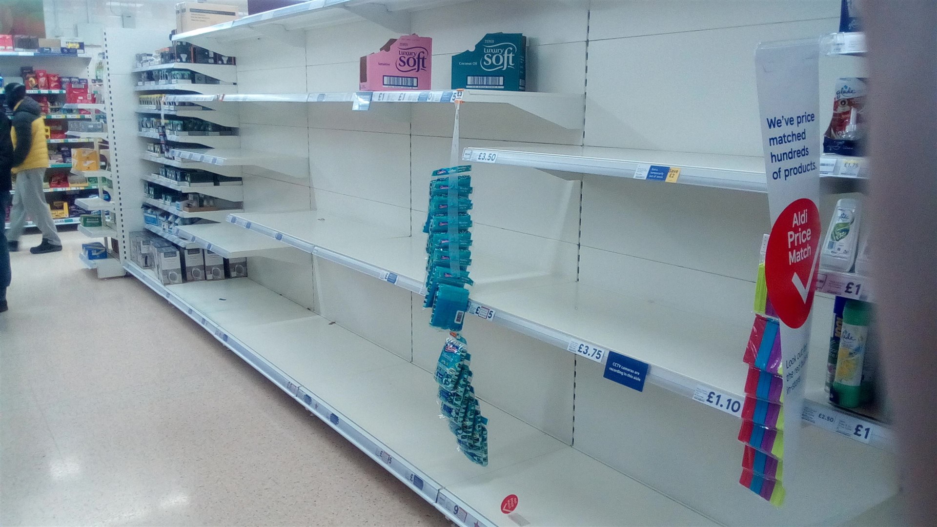 The shelves emptied of loo roll in Tesco in Aviemore last week.