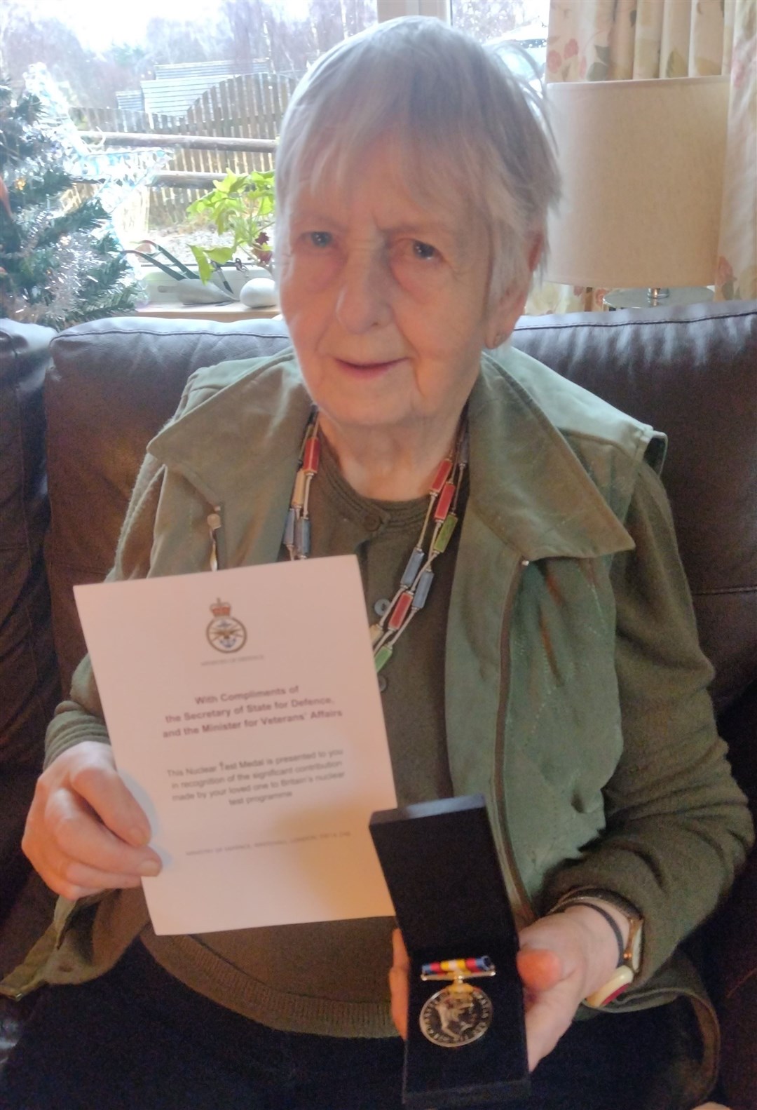UNSURE WHAT TO DO WITH IT: Babs Paterson with the 'other' medal won by her husband.