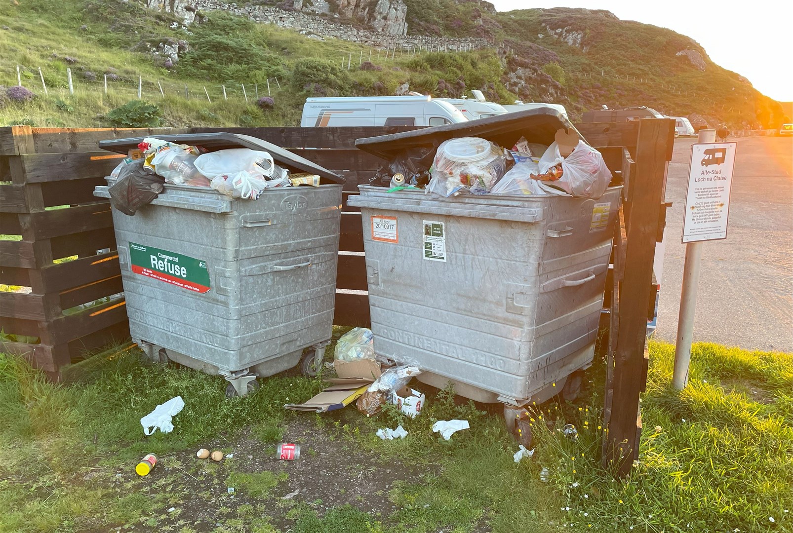 Overflowing waste bins on the NC500 at Loch Clash motorhome stopover, Kinlochbervie.