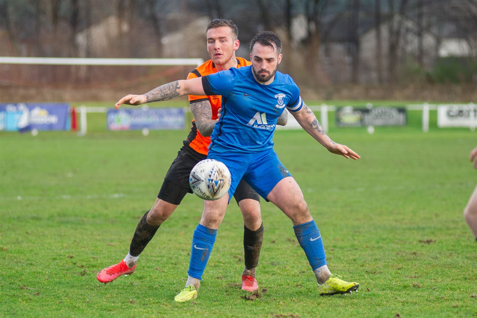 Rothes' Darryl McHardy and Strathspey's James Fraser compete for the ball. ..Rothes FC (3) vs Strathspey Thistle (2) - Highland Football League 01/02/2020 - MacKessack Park, Rothes...Picture: Daniel Forsyth..