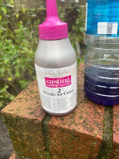 An acid-filled bottle seized by police from Gilson Martins (GMP/PA)