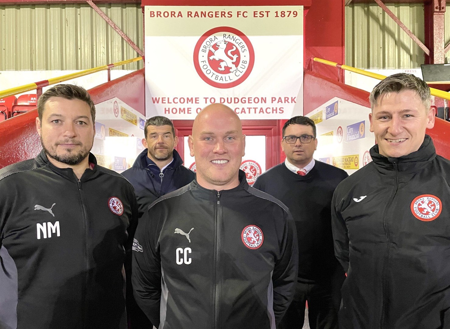 Craig Campbell (centre) was confirmed as new manager, pictured here with coaches Neil Macdoanld (left) and Josh Meekings, wth chairman Scott Mackay and vice-chairman Ally Mackenzie